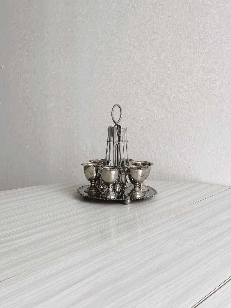 Set of 6 antique silver-plated egg cups with stand, vintage kitchen item, retro egg cups with wear, old-world charm