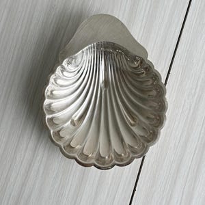 Antique lightweight metal dish in the shape of a seashell, decorative trinket tray inspired by the marine world, unusual antique item, elegant gift