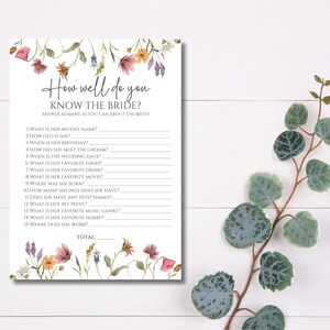 May include: A printable bridal shower game with a floral border. The game asks "How well do you know the bride?" and includes 15 questions about the bride's personal information, such as her middle name, birthday, and favorite food.
