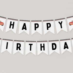 May include: A white banner with black letters spelling "Happy Birthday" with red and black chequered trim. The banner has two red cartoon race cars on the ends.