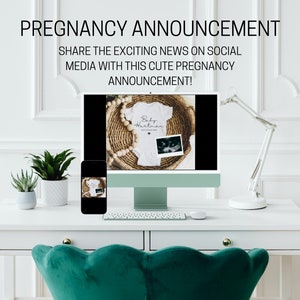 May include: A computer screen shows a mockup of a white onesie with the text "Baby Hartman" and a sonogram image. The onesie is in a wicker basket with wooden beads. A smartphone with a similar image is on a white desk with a keyboard and a lamp.