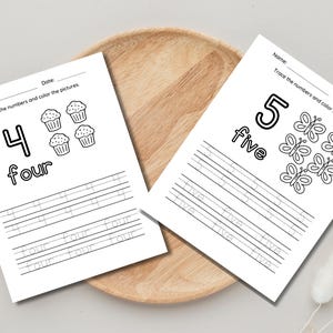 以下が含まれることがあります： 4と5の数字をなぞるための白黒の印刷可能なワークシート。ワークシートには、着色するためのカップケーキと蝶の画像が含まれています。