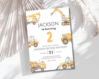 May include: A yellow and white construction themed birthday invitation for a boy turning two. The invitation features a yellow number two, the name Jackson, and a variety of construction vehicles. The text reads "Jackson is turning 2. Join the crew to celebrate Jackson's Second Birthday. October 31, 3:00 PM. Jackson's Construction Site, 1234 Main Street, Dallas, TX 75062. RSVP to Alyssa."
