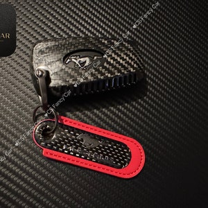 Couverture de porte-clés en fibre de carbone véritable de qualité supérieure pour Ford Mustang Exclusive Made