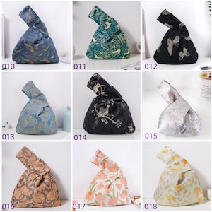 May include: A collection of decorative knot bags in various colors and patterns. The bags feature designs such as butterflies, birds, and floral motifs. The bags are made of fabric and have a unique knot closure.