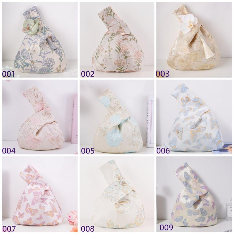 May include: Nine fabric knot bags in various floral and butterfly patterns. Each bag has a unique design, with colors ranging from light blue and pink to cream and gold. Some bags feature decorative accents.