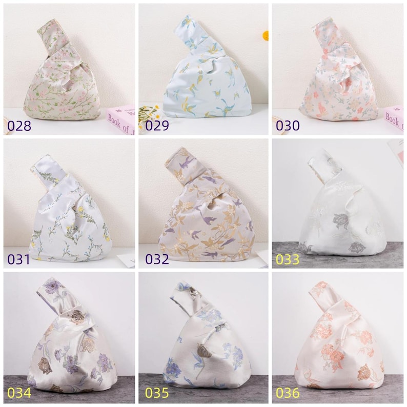May include: Nine fabric knot bags in various colors and floral patterns. Each bag has a unique design, including light pink, blue, and white with floral and bird motifs. The bags are arranged in a grid, with numbers from 028 to 036.