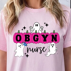 Trendy Pink OBGYN Nurse Halloween Retro Ghost & Pumpkin Shirt for Obstetrics and Gynecology Hospital Staff/Squad/Crew/Unit. Cute Spooky Tee.