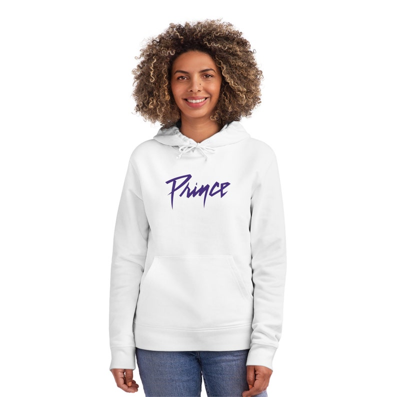 May include: White hooded sweatshirt with a purple "Prince" logo printed on the front.
