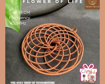 May include: A copper-colored, circular Flower of Life design. The image includes the text "FLOWER OF LIFE", "Size 39 CM", "Frequency 432MHz", and "THE ONLY SHOP OF TENSORSTORE". The design is approximately 15 inches in diameter.