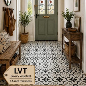 May include: An entryway with a patterned black, white, and gray luxury vinyl tile floor. A wooden bench, table, and door are visible. The door has stained glass windows. The text on the tag reads "LVT (luxury vinyl tile) 1,5 mm thickness."