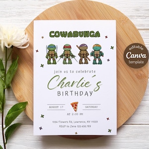 May include: A white invitation card with the text "COWABUNGA" and illustrations of the Teenage Mutant Ninja Turtles. The invitation is for Charlie's birthday, with the date August 17 and the time 2:00 PM. The card includes an RSVP and address.