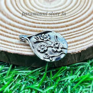 Sterling Silver Floral Pendant: Handmade Pear-Shaped Artisan Jewelry