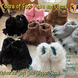 Puede incluir: Una variedad de seis colores de zapatillas con garras y patas de suela blanda. Las zapatillas están disponibles en negro, rosa, marrón, gris, blanco y un marrón más claro. La imagen incluye el texto "Tallas Universales" para mujeres y hombres.