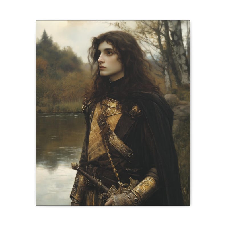 May include: A young person with long dark hair wearing a black cloak and gold armour stands by a river in a forest. The person is looking off to the side.