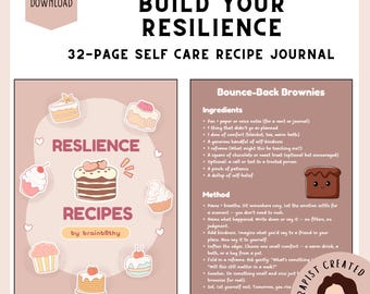 May include: A 32-page self-care recipe journal titled Build Your Resilience. The cover features illustrations of cakes and cupcakes with the text Resilience Recipes by brainb8thy. The interior page lists ingredients and methods for Bounce-Back Brownies.
