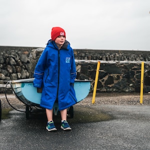 CosiRobe FLEX Junior: Albornoz impermeable con forro polar - Azul