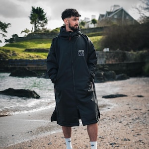 Albornoz impermeable con forro polar / Para aventuras al aire libre