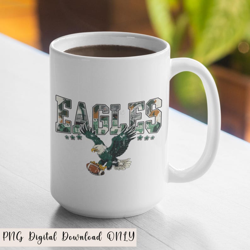 May include: White ceramic mug featuring the word "EAGLES" in a camouflage design, with an eagle holding a football. The mug also has the text "PNG Digital Download ONLY" at the bottom.