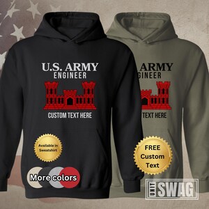 May include: Black and olive green hooded sweatshirts. The black sweatshirt displays "U.S. ARMY ENGINEER" above a red castle graphic and "CUSTOM TEXT HERE." The olive green sweatshirt has similar text. Additional options are available.