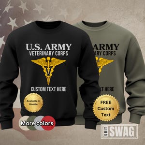 May include: Black and green sweatshirt with the text "U.S. ARMY VETERINARY CORPS" and a gold medical symbol. The sweatshirt is available in a hoodie style. The text "CUSTOM TEXT HERE" is below the symbol. There is a gold seal with the text "FREE Custom Text".
