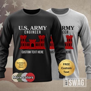 May include: Black and gray long-sleeve shirts with the text "U.S. ARMY ENGINEER" and a red castle graphic. The shirts have the text "CUSTOM TEXT HERE" below the graphic. Additional text includes "Available in Short Sleeve" and "FREE Custom Text".