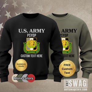May include: Black and olive green sweatshirts with the text "U.S. ARMY PSYOP" and a crest design. The crest includes a horse, laurel leaves, and the words "Persuade, Change, Influence." The sweatshirts have the words "Custom Text Here."
