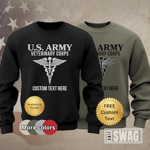May include: Black and green sweatshirt with the text "U.S. ARMY VETERINARY CORPS" and a medical symbol. The sweatshirt also has the text "CUSTOM TEXT HERE" and a gold star sticker that says "Available in Hoodie".