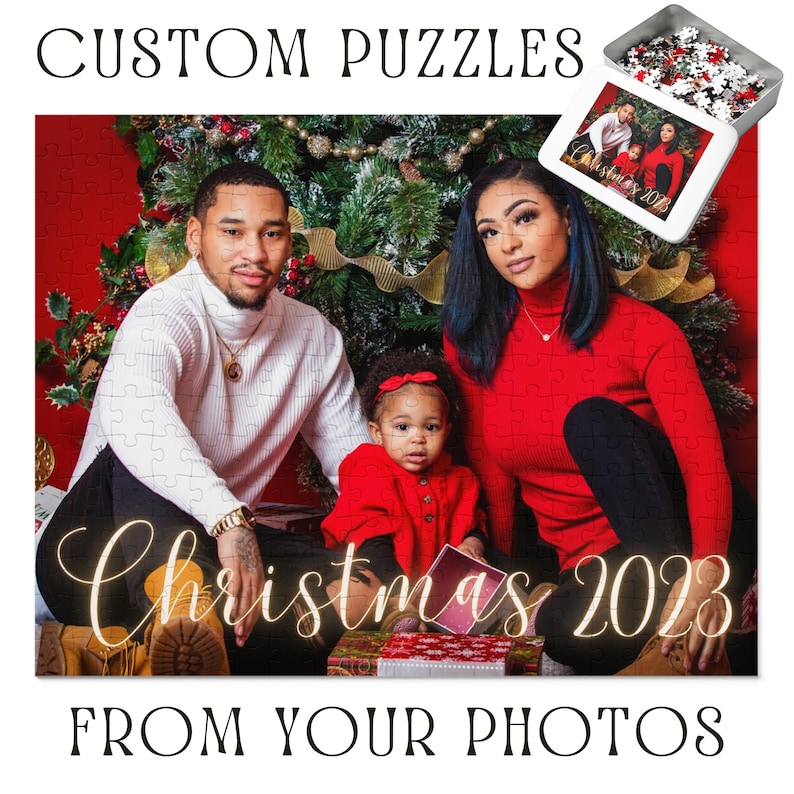 May include: A family of three pose in front of a Christmas tree. The parents are wearing red and white jumpers, and the child is wearing a red jumper and a red bow. The text "Christmas 2023" is written in gold lettering on the bottom of the image.