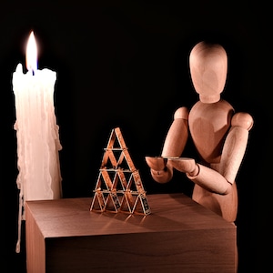 Golden House of Illusion. Golden Dreams: Wooden Doll and Card House. Digital posters.