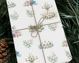 May include: White gift wrap with a repeating pattern of doves, crosses, candles, and flowers. The paper is tied with twine.