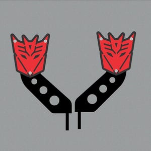 May include: Two red and black stylized emblems, each featuring a red symbol with a black outline, are connected to black, angled bars with circular cutouts. The background is a speckled gray.