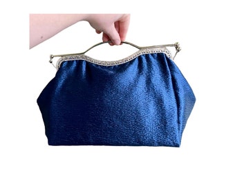 Borsa capiente fatta a mano in tessuto blu goffato