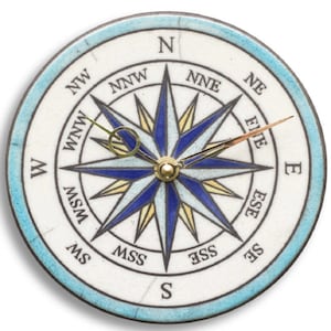 Handmade Raku ceramic wall clock with a Compass Rose design - 29 cm diameter