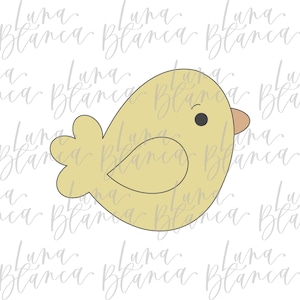 May include: A yellow chick-shaped cookie cutter with a black eye and a tan beak. The cookie cutter has a simple design, perfect for making Easter or spring-themed treats. The cutter is made of metal.
