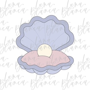 May include: A light blue seashell cookie cutter with a pearl inside. The shell is open, revealing a pink interior. The design is outlined in a darker blue, with the text "Luna Blanca" in the background.