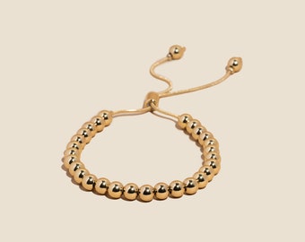 Adjustable Gold Beaded Bracelet by West Jem Collective