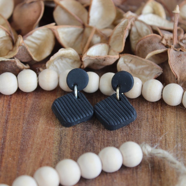 lined black hanging polymer clay earrings
