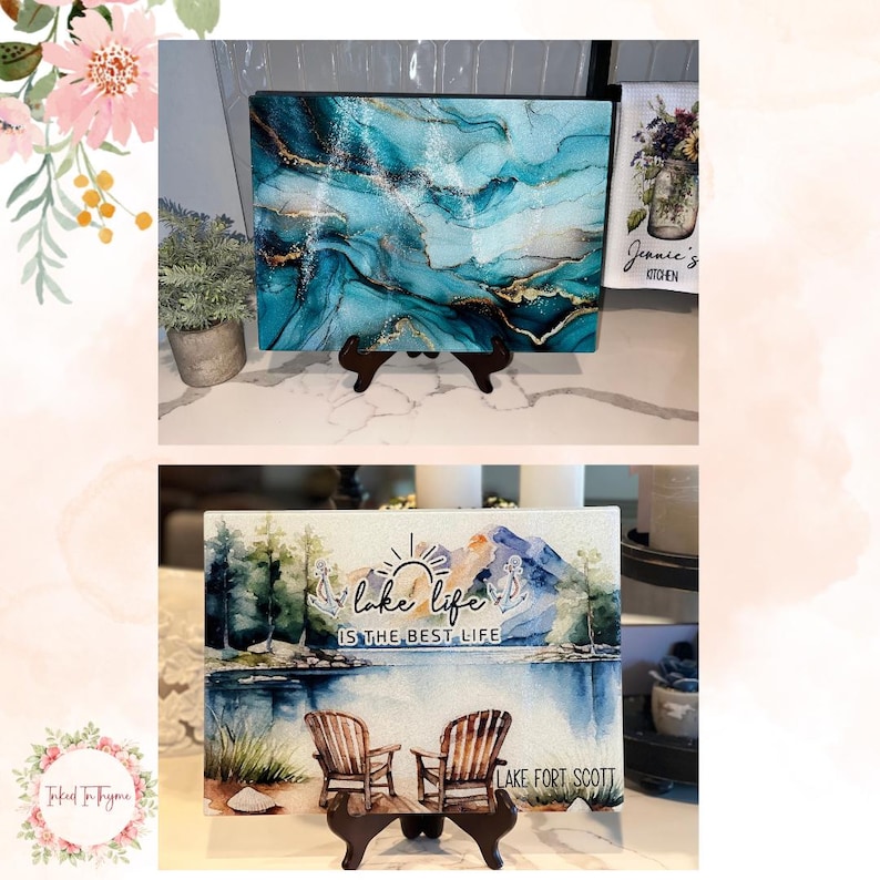 May include: Two decorative art pieces. The top piece features an abstract design with teal, gold, and white swirls. The bottom piece displays a lake scene with Adirondack chairs and the text "Lake Life is the Best Life" and "Lake Fort Scott".