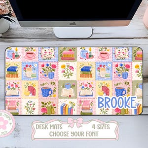 May include: A colorful desk mat featuring a patchwork design with books, flowers, teacups, and candles. The mat has the name "Brooke" in blue script. The bottom of the mat has text that reads "DESK MATS, 4 SIZES, CHOOSE YOUR FONT".