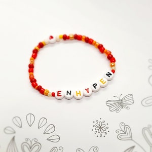 Enhypen bracelet with orange glass beads for Engenes or k pop fans
