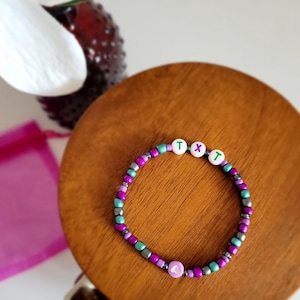 Tomorrow by Together purple beaded bracelet