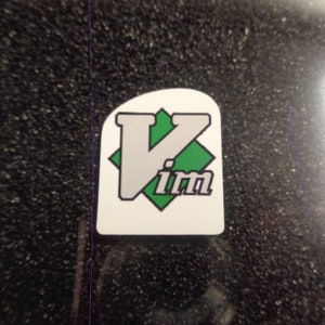 VIM Vinyl Sticker Logo Emblem Badge 19x24mm [802]