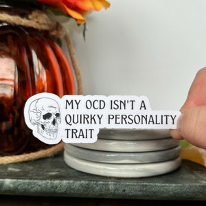 OCD Isn’t A Personality Trait Sticker - Handmade, OCD, Mental Health, Quote, Awareness, Advocacy, Skull, Intrusive Thoughts, Laptop Decal