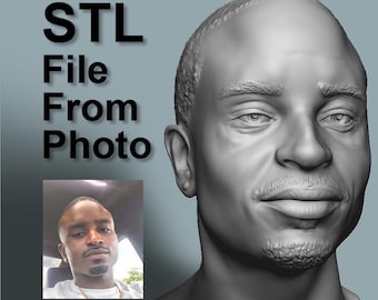 May include: A grayscale 3D printed bust of a man's face, with a small photo of the same man below the text "STL File From Photo". The bust has detailed facial features, including a goatee and short hair.