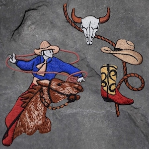 May include: Embroidered patch of a cowboy riding a brown horse with a blue shirt, red pants, and a brown hat. The cowboy is holding a lasso. There is also a skull with horns, a cowboy hat, and a red cowboy boot.