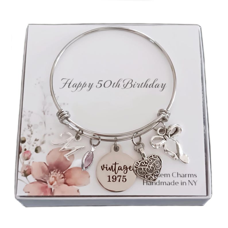 bracelet shown with 'Happy 50th Birthday' floral box card