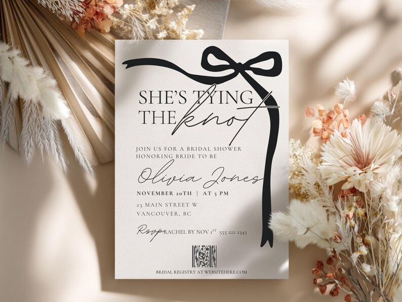 shes tying the knot wedding shower or bachelorette party invitation editable and printable template. black and white with black coquette bow and QR code for bridal shower registry