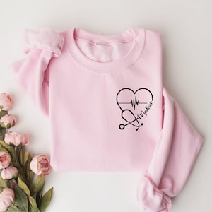 Custom Nurse Sweatshirt, Personalized Sweater, Nurse Pocket Sweatshirt, Nurse Life Hoodie, Nurse Sweatshirt, Custom Nurse Gift Light Pink