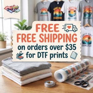 May include: Image featuring a stack of folded t-shirts, a roll of printed transfer paper, and a pair of scissors. A sign reads "FREE SHIPPING on orders over $35 for DTF prints." Several t-shirts with sunset designs are displayed on hangers in the background.